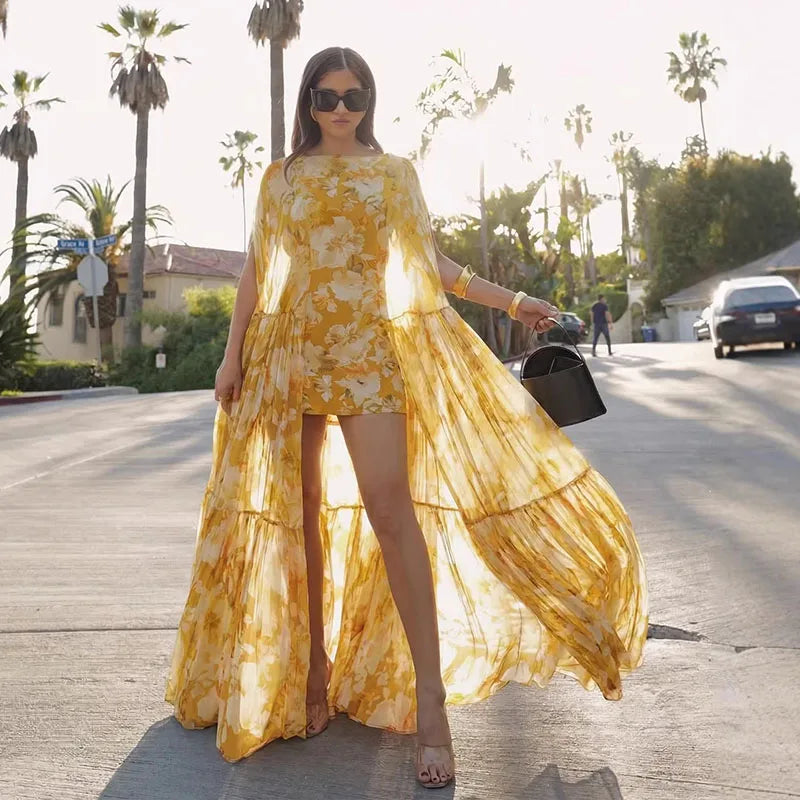 Alvéra | Flowing Maxi Overlay Jurk met Cape Effect