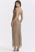 Dazzling Diva | Gouden Maxi Jurk met Subtiele Pailletten Glans