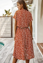 Zanelya | Midi jurk met Abstracte Stippenprint & Knoopsluiting